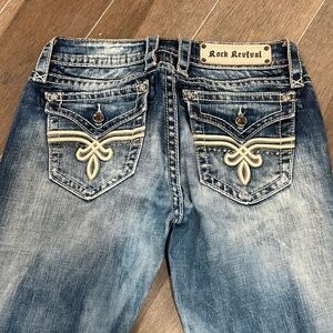 Rock Revival Faded Blue Jeans with Embroidered Pockets